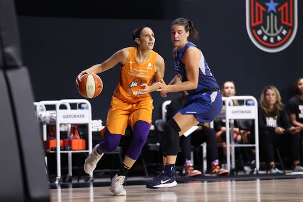 Diana Taurasi of the Phoenix Mercury drives to the basket against the Minnesota Lynx on Friday