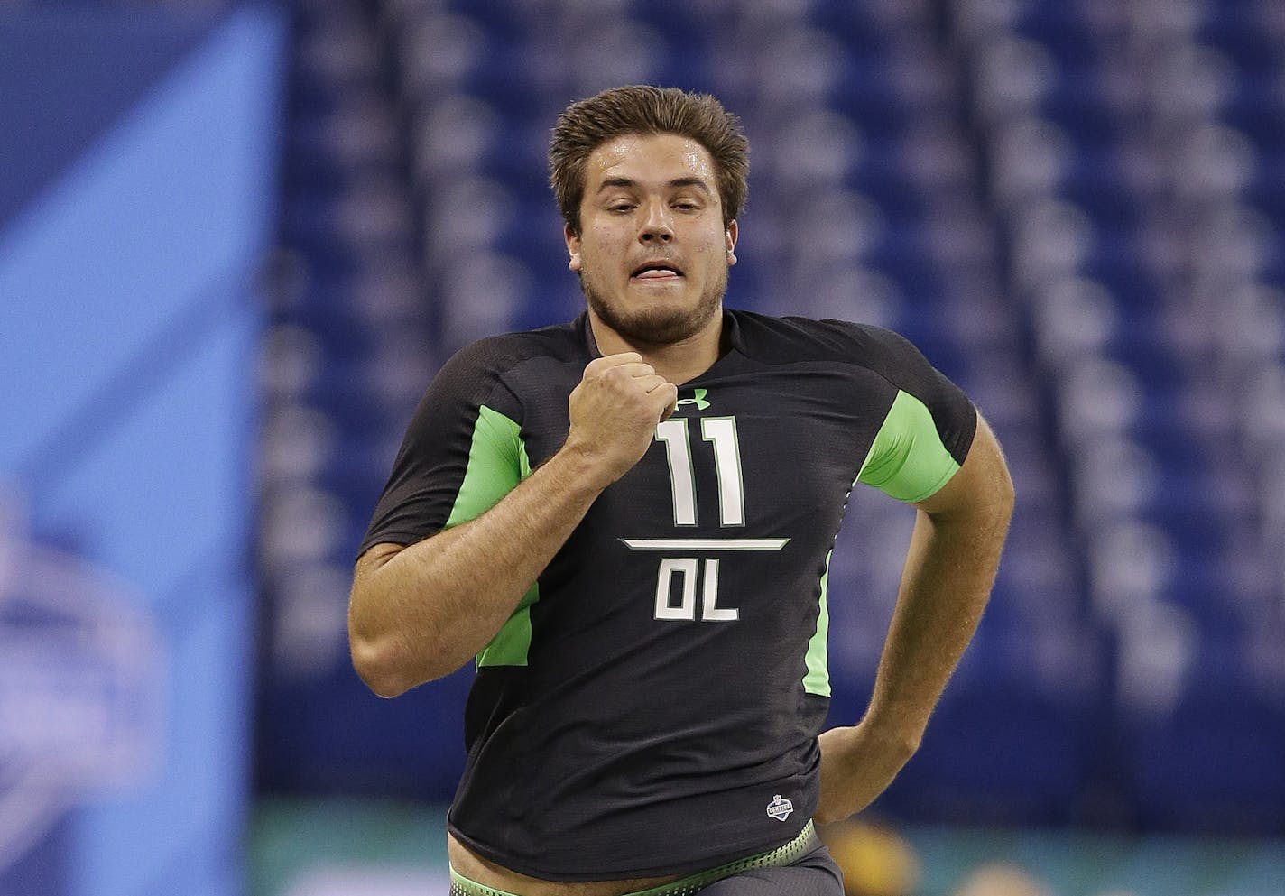 Michigan State offensive lineman Jack Conklin runs the 40-yard dash at the NFL football scouting combine in Friday, Feb. 26, 2016, in Indianapolis. (AP Photo/Darron Cummings)