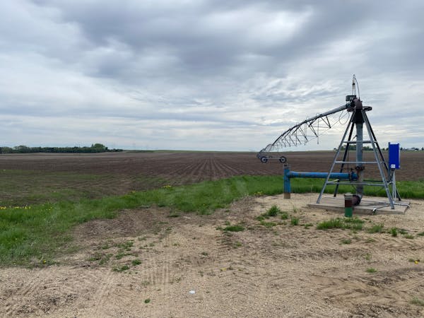 An irrigation unit parked on a tilled field in Dakota County in May 2022.