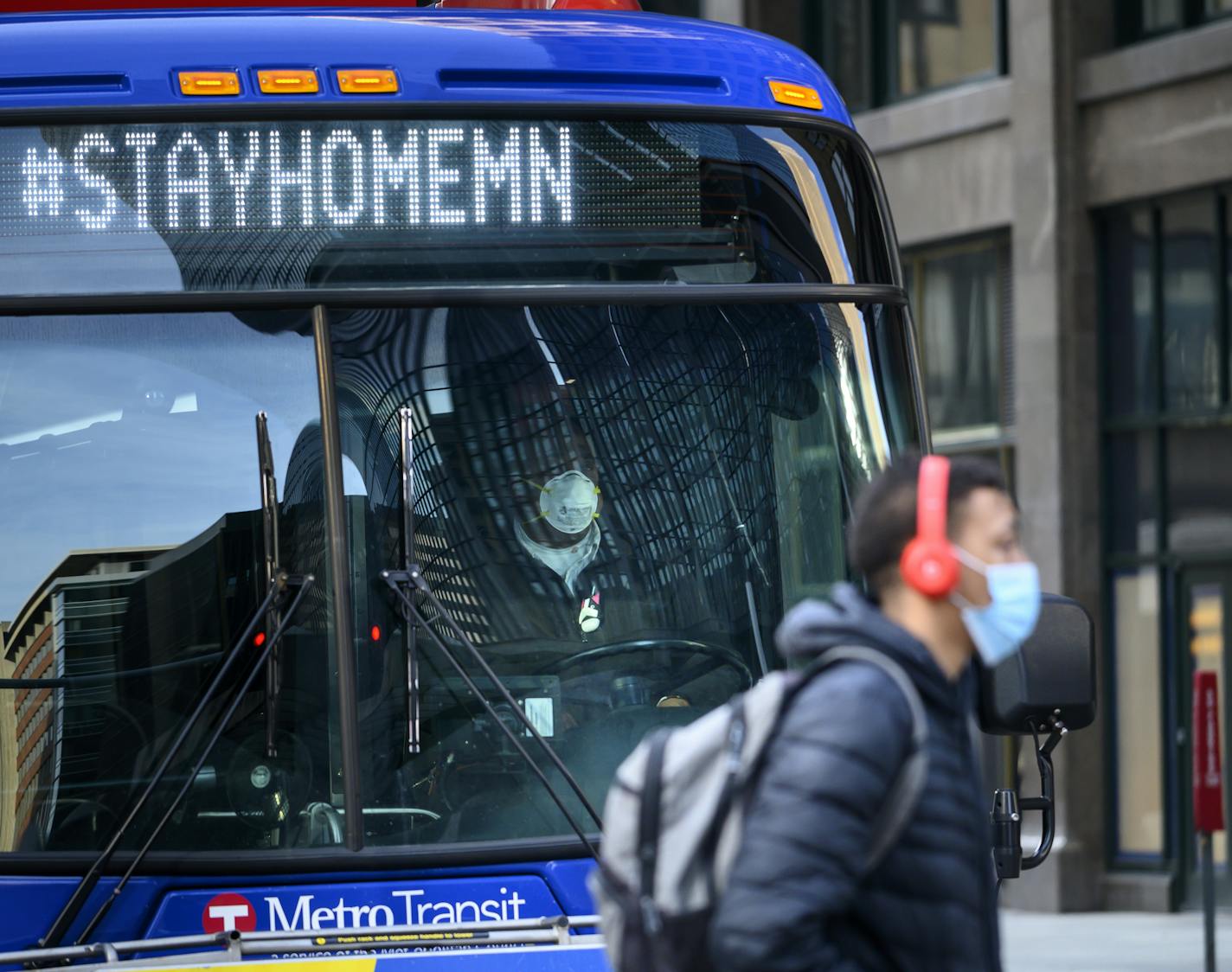 Face masks were a common sight on Nicollet Mall in downtown Minneapolis on Thursday during the rush hour commute.