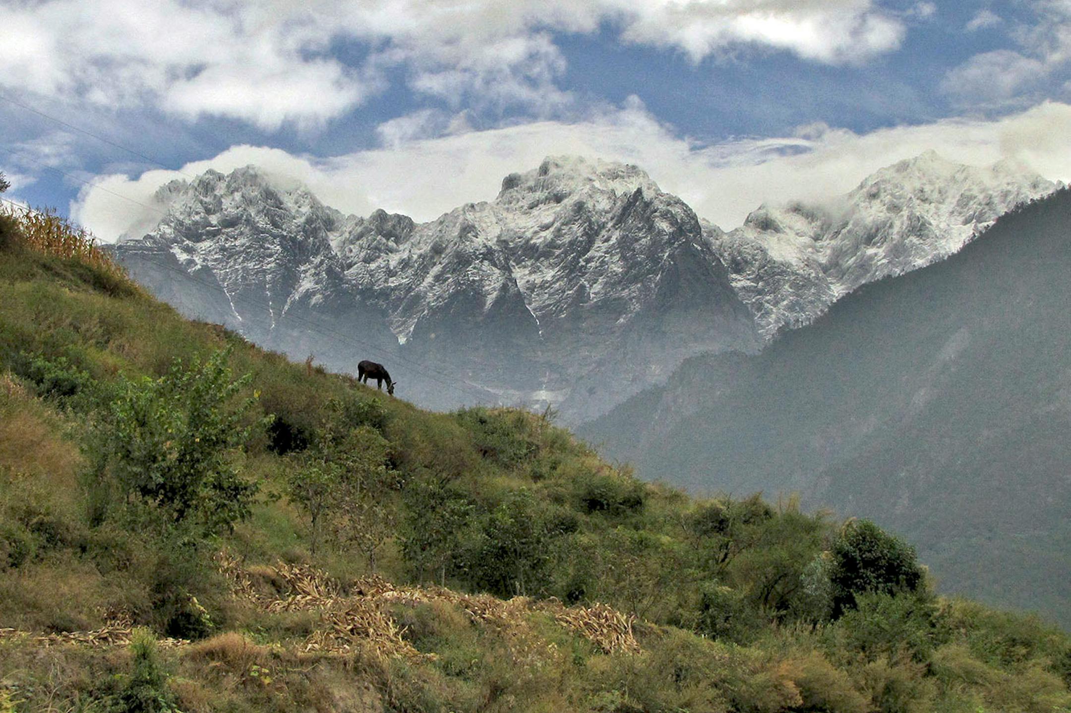 The Tiger Leaping Gorge trail offers views of Jade Dragon Snow Mountain, the most southerly snow-capped mountain in the Northern Hemisphere outside of the Andes.