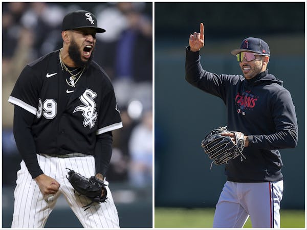 Carlos Correa (right) took the high road after White Sox reliever Keynan Middleton (left) called him a cheater on Wednesday.
