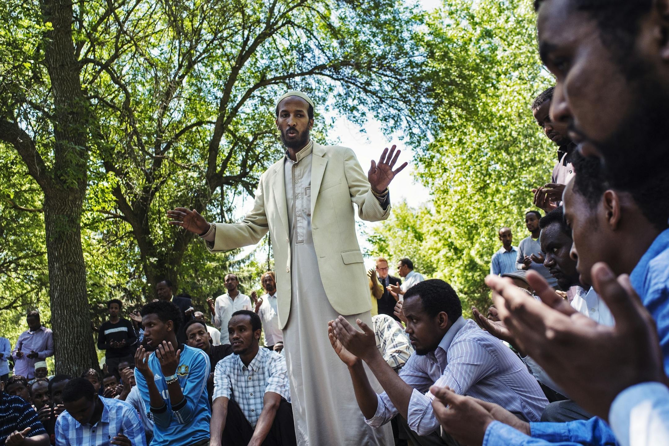 Imam Sheikh Aden Hassan said some final prayers for the two boys. [In Willmar where Ahmed Ashi, 11 who drowned along with childhood friend Idris Hussein,11, the community came together to lay the boys to rest.Richard Tsong-Taatarii/rtsong-taatarii@startribune.com