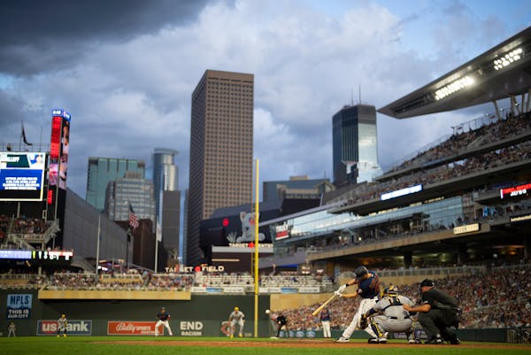 Three rain delays, two halted rallies in Twins 6-3 loss to Milwaukee