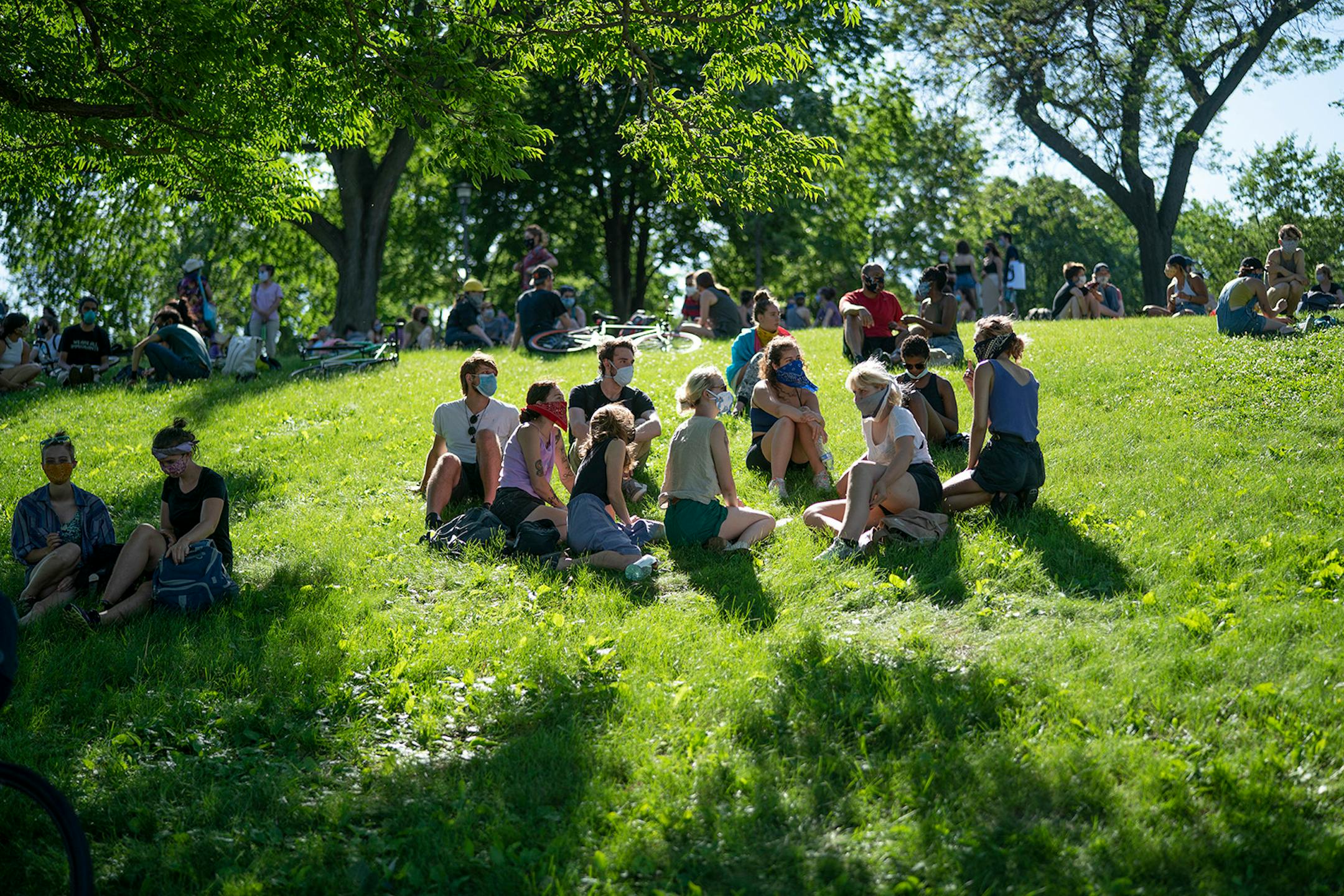 Community members gathered at "The Path Forward" meeting on Sunday, June 7, at Powderhorn Park in Minneapolis.