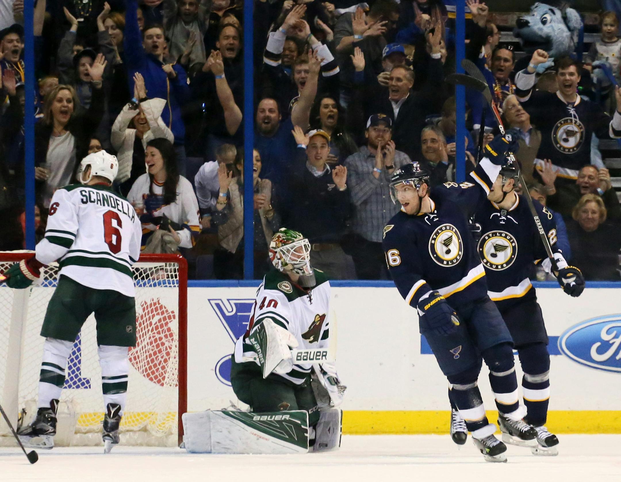 St. Louis Blues center Paul Stastny, second from right, reacts after scoring an unassisted goal past Minnesota Wild goaltender Devan Dubnyk during the second period on Saturday, Feb. 6, 2016, at the Scottrade Center in St. Louis. (Chris Lee/St. Louis Post-Dispatch/TNS) ORG XMIT: 1180383