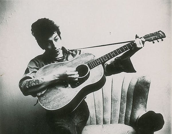 A 1963 photo of Bob Dylan from Tony Glover's personal collection, shot by Don Hunstein in Dylan's New York apartment, (Courtesy RR Auction.)