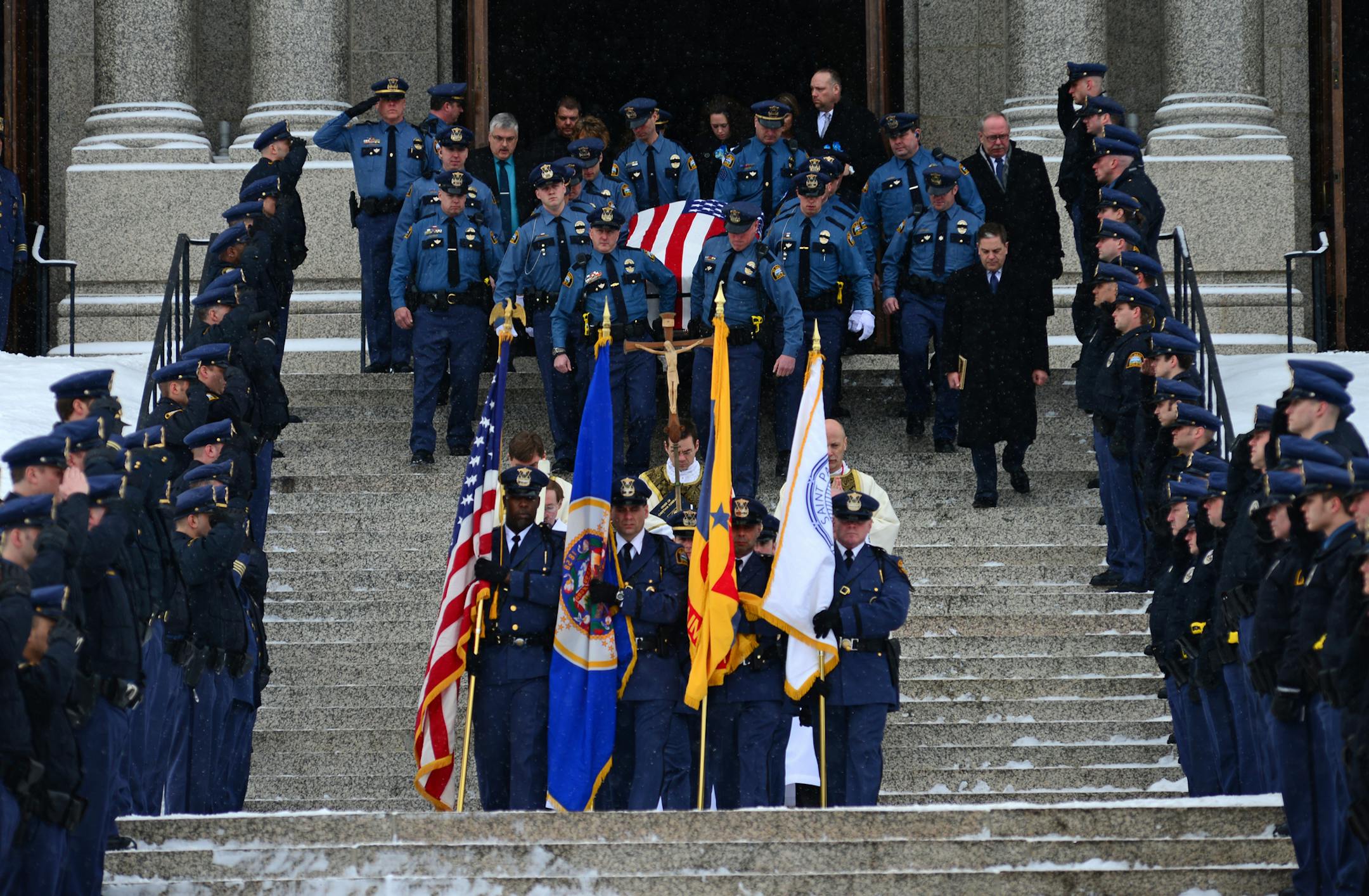 Officer Josh Lynaugh's funeral was held at the Cathederal of St. Paul. Hundreds of Police officers from across the state attended the service. . ] Richard.Sennott@startribune.com Richard Sennott/Star Tribune. , St Paul Minn. Friday 2/22/13) ** (cq)