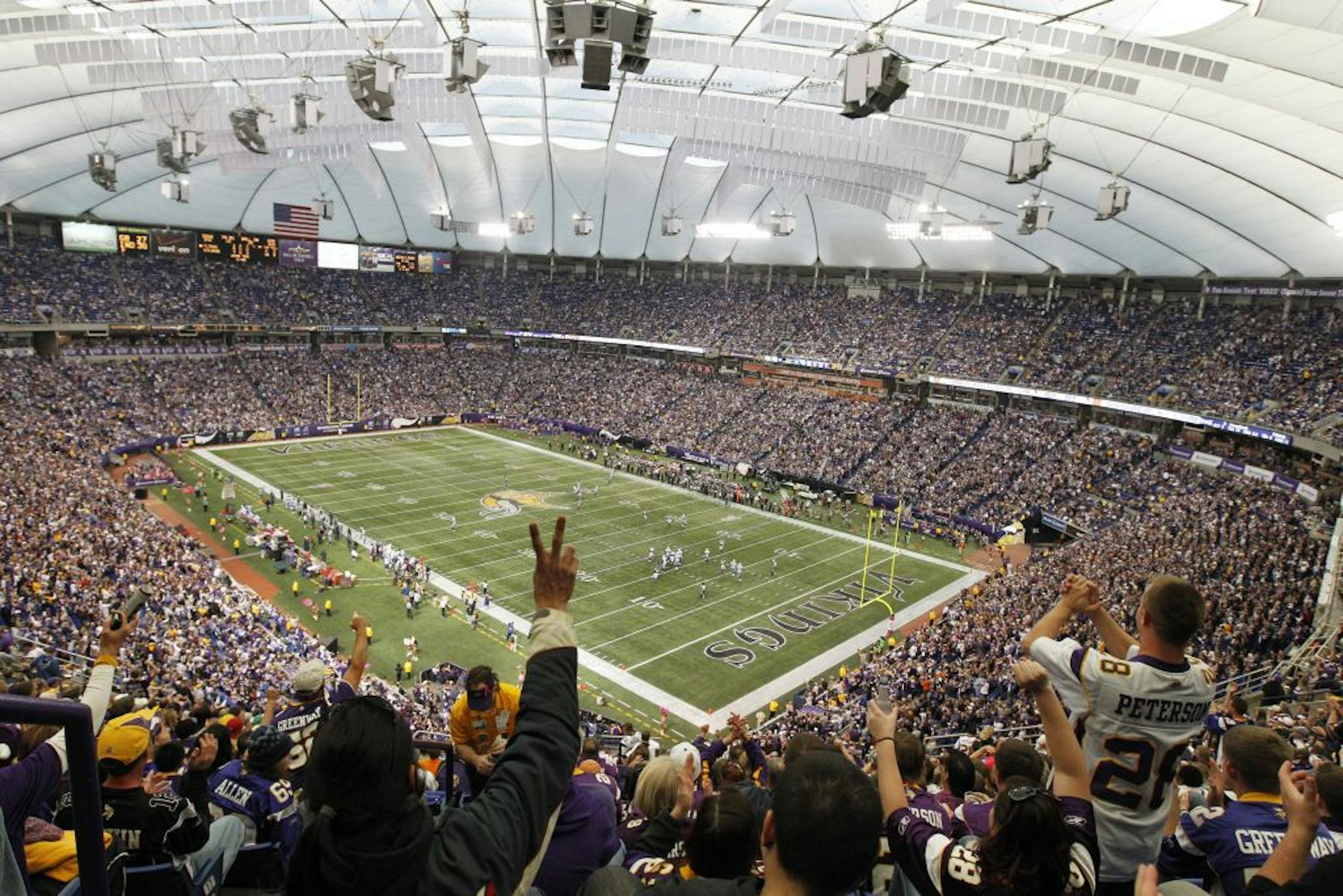 Minnesota Vikings fans cheer during the second half of an NFL football game between the Minnesota Vikings and the Tennessee Titans Sunday, Oct. 7, 2012, in Minneapolis.