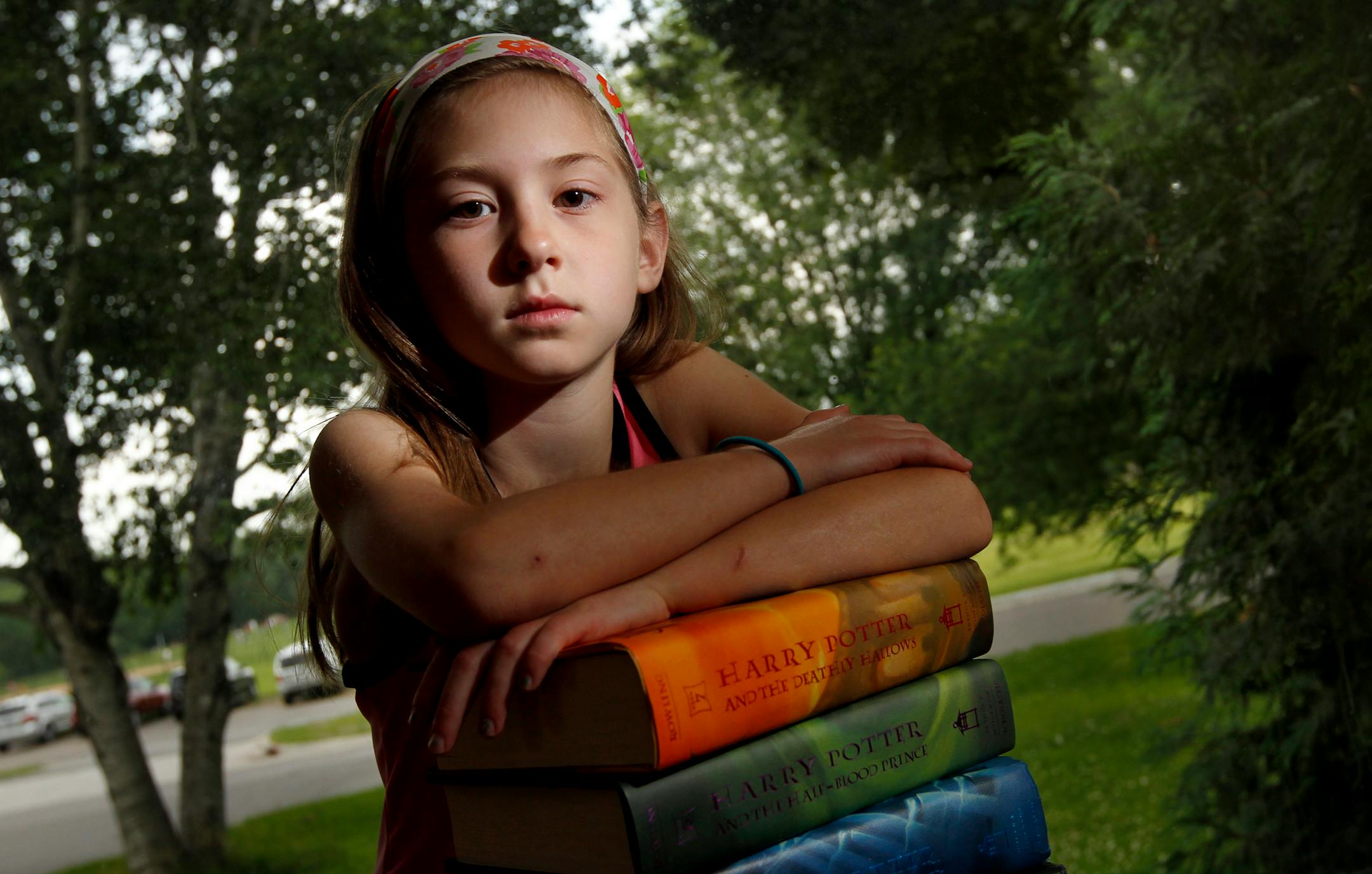 Maggie Andresen, 9, has been devouring the Harry Potter books and wants to see the movie version of the final installment. Mom Angie Andresen isn't so sure and is waiting to read reviews first. Maggie has seen the first two movies in the series.