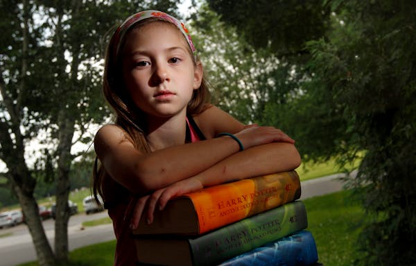Maggie Andresen, 9, has been devouring the Harry Potter books and wants to see the movie version of the final installment. Mom Angie Andresen isn't so