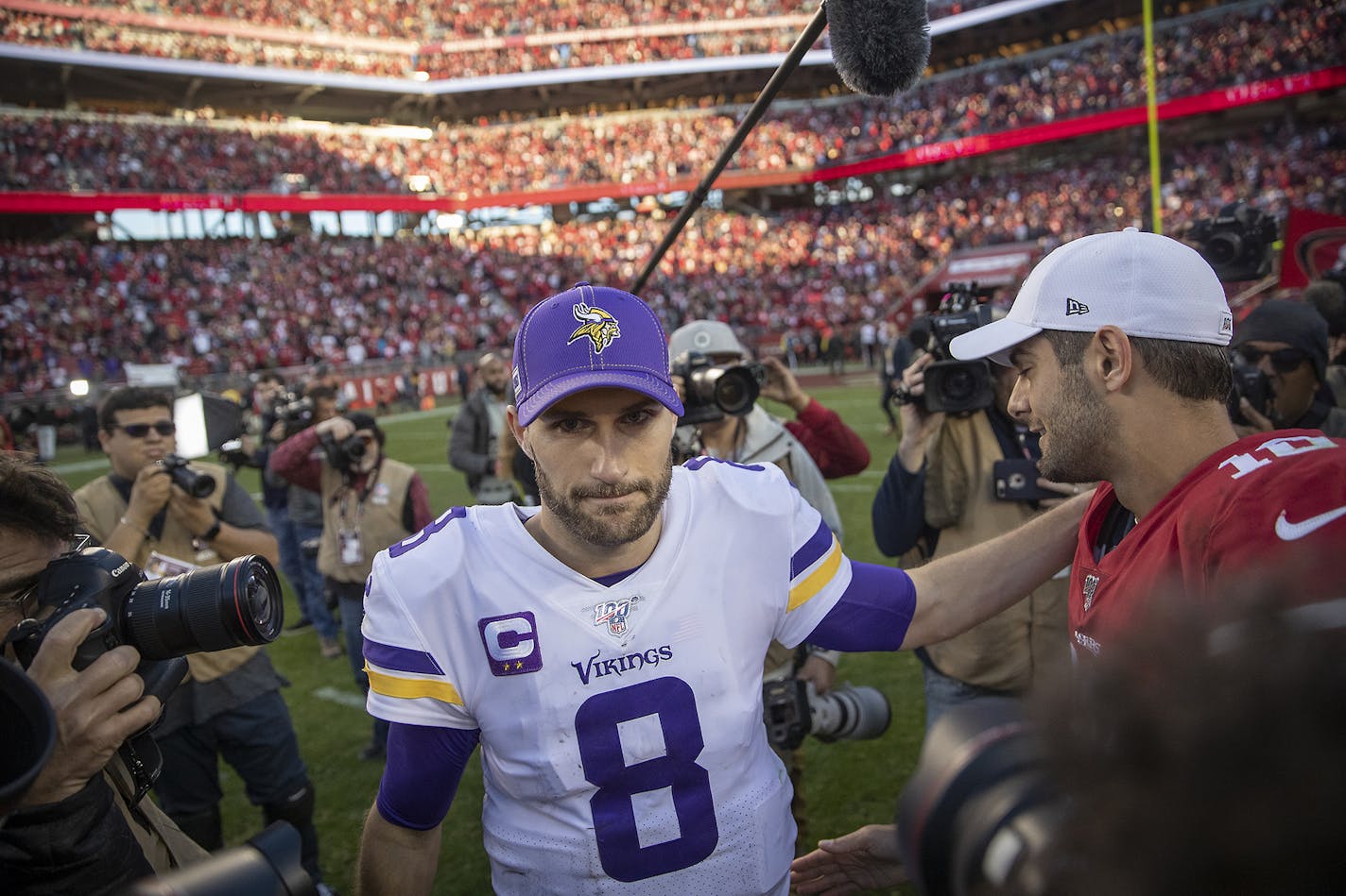 Minnesota Vikings quarterback Kirk Cousins (8) congratulates San Francisco 49ers quarterback Jimmy Garoppolo (10) after the NFC Divisional Round Playoffs at Levi's Stadium in Santa Clara, Calif., on Saturday, Jan. 11, 2020. The 49ers advanced, 27-10. (Elizabeth Flores/Minneapolis Star Tribune/TNS) ORG XMIT: 1539139