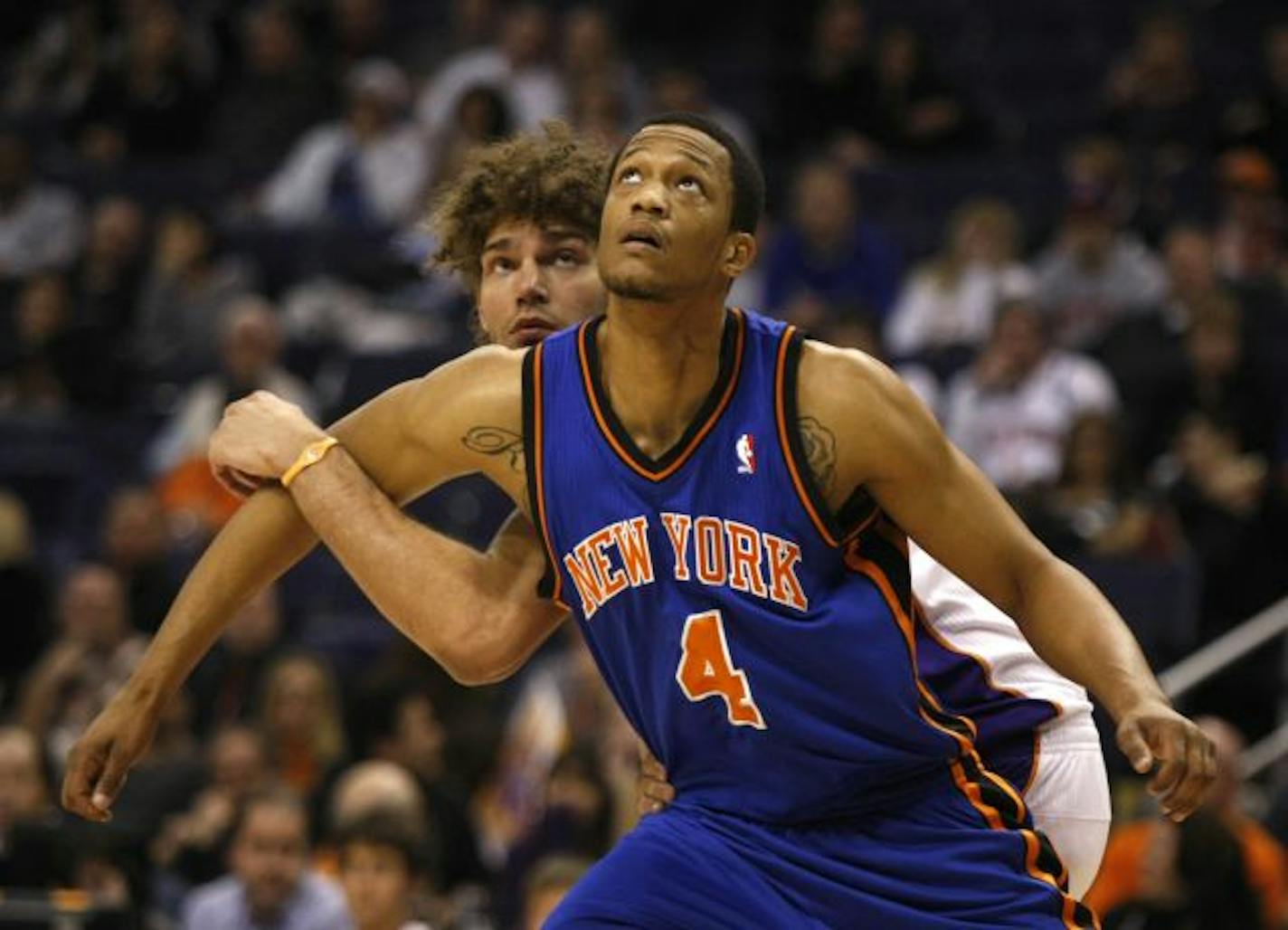 New Wolves forward Anthony Randolph, shown in a Knicks game against the Phoenix Suns, is on his third team in as many years.