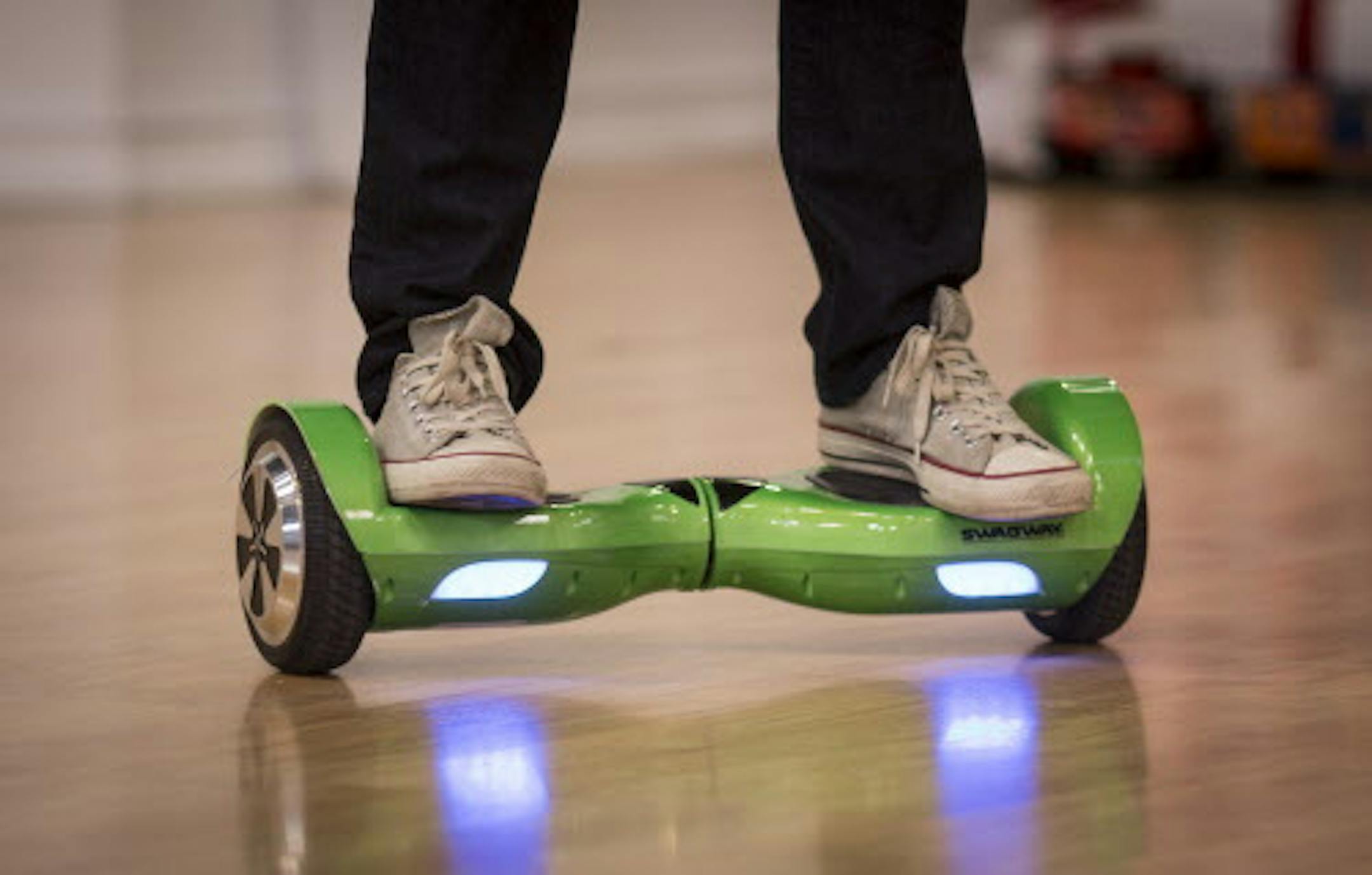 Evine Live, the Eden Prairie-based home shopping network, did a segment on Swagway, or self-balancing scooters, on Tuesday, November 17, 2015, in Eden Prairie, Minn. Pictured is host Sasha Andreev riding a Swagway. ] RENEE JONES SCHNEIDER &#x2022; reneejones@startribune.com