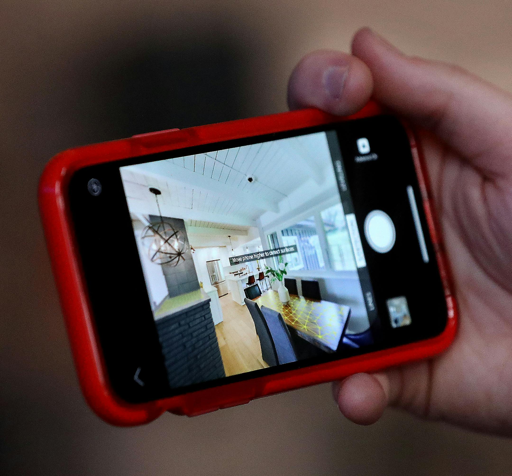 Johnny Fuerst, a real estate photographer and business owner along with his wife, has developed a photography app that might someday replace him. Zota, as it is called "is the free real estate photographer that lives on your phone," Fuerst said about the app that is nearly ready for launching and was developed for the iPhone 11 Pro Max.] DAVID JOLES • david.joles@startribune.com Johnny Fuerst, a real estate photographer and business owner along with his wife, who has developed a photograp