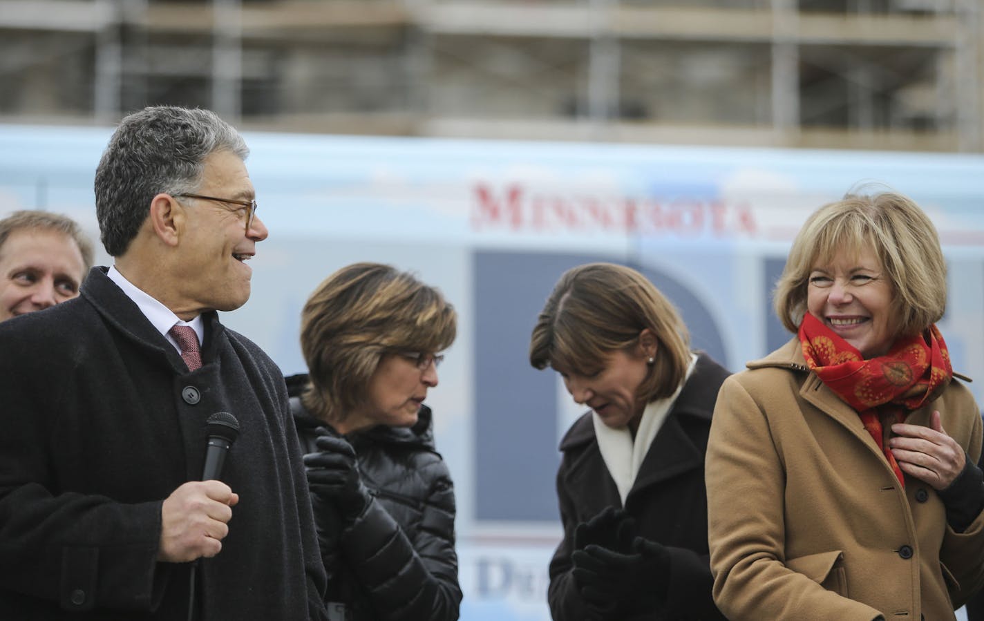 FILE: Sen. Al Franken chats with incoming senator Tina Smith.