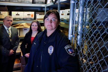 Crystal Police Chief Stephanie Revering, right, and primary investigators Lt. Derrick Hacker, left, and Julie Severson, center, in the evidence room a