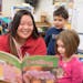 Reading Corps tutor Bau Xiong kept young readers engrossed at Earle Brown Elementary/Brooklyn Center School Readiness.