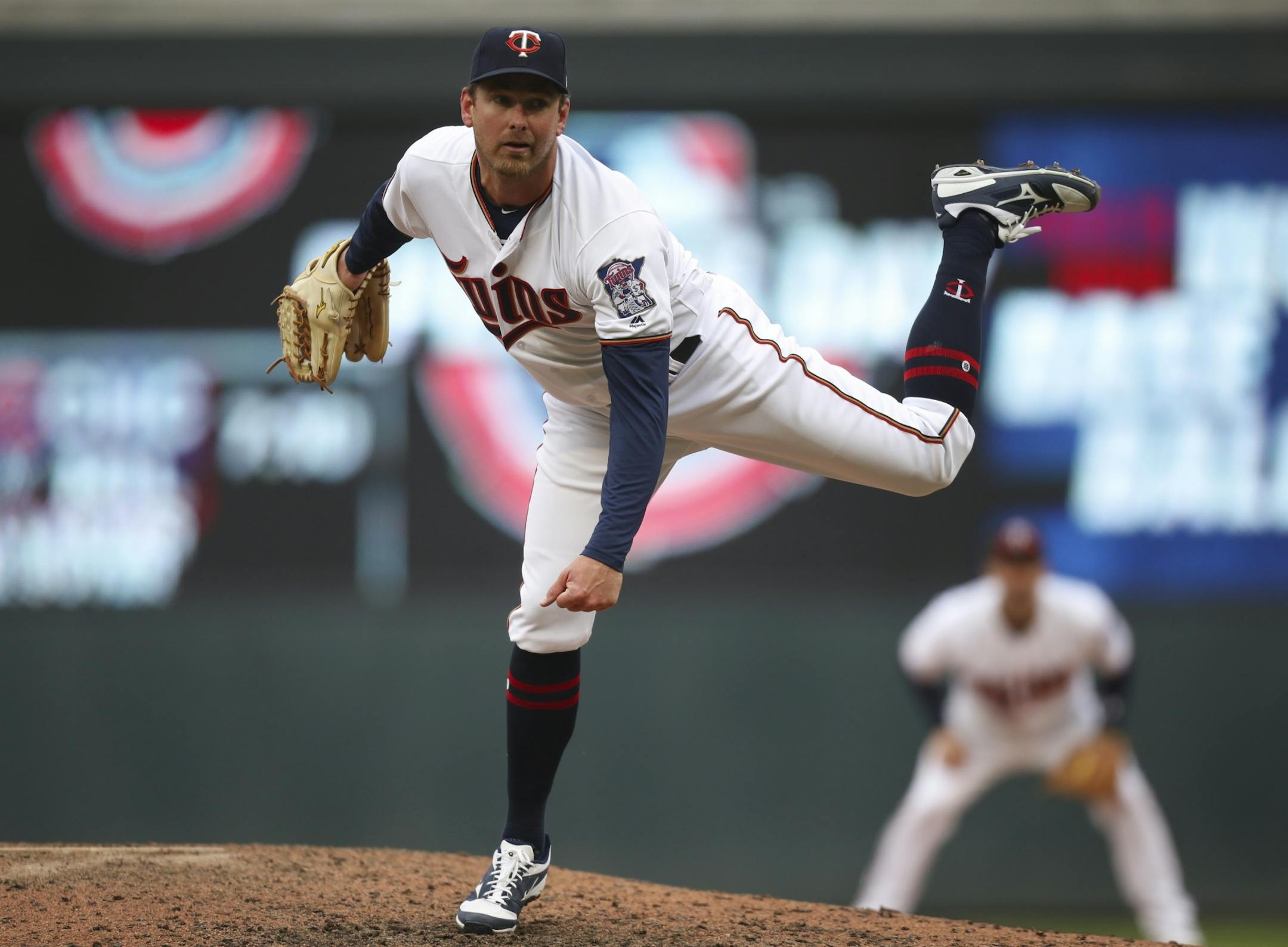 Minnesota Twins relief pitcher Zach Duke throwing in the seventh inning against Seattle.