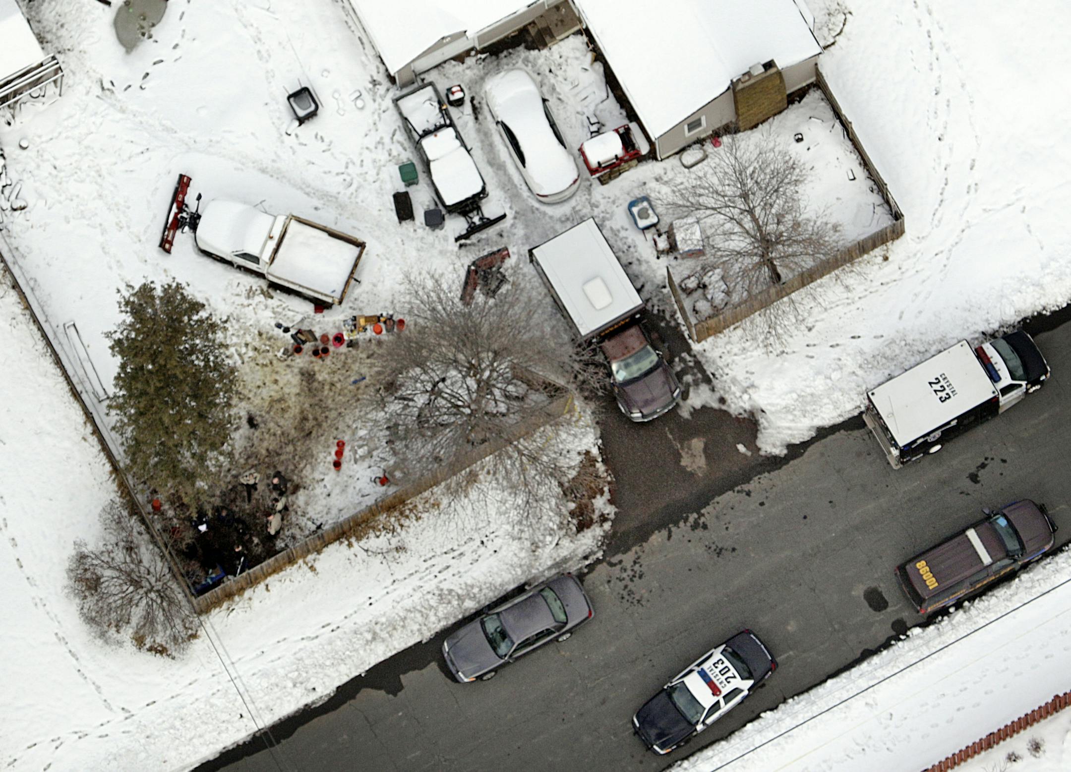 Authorities are searching Wednesday in and around a home in Crystal based on police learning of a possible death years ago involving an infant.