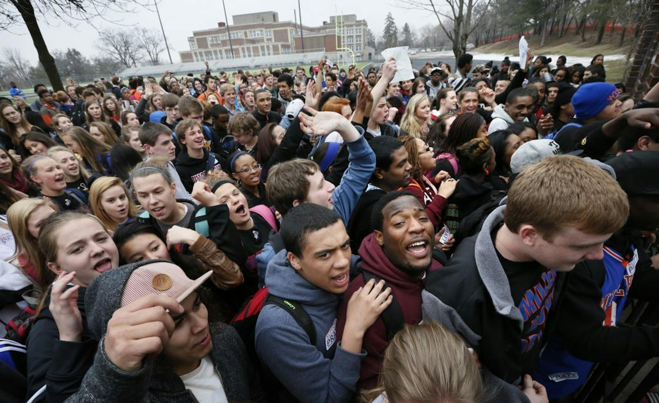 Hundreds of students poured out of Washburn High School early Monday afternoon in support of embattled school Athletic Director Dan Pratt. They gathered on the school's new synthetic turf field that Pratt and others raised money to buy and install. "We've got quite a group of kids," said Jamison Whiting, a senior four-sport athlete. Students and others involved with Washburn athletics said the issue involves whether Pratt obtained proper approvals for a scoreboard that was to be installed when t