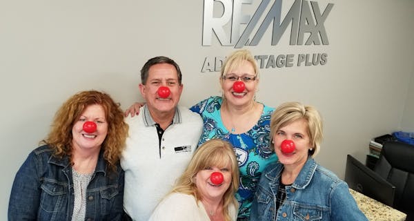(left to right) Teri Wirt, Randy Walker, Sherry Lewandowski (lower), Lisa Handley, Julie Gould. All are licensed Sales Associates with RE/MAX Advantag