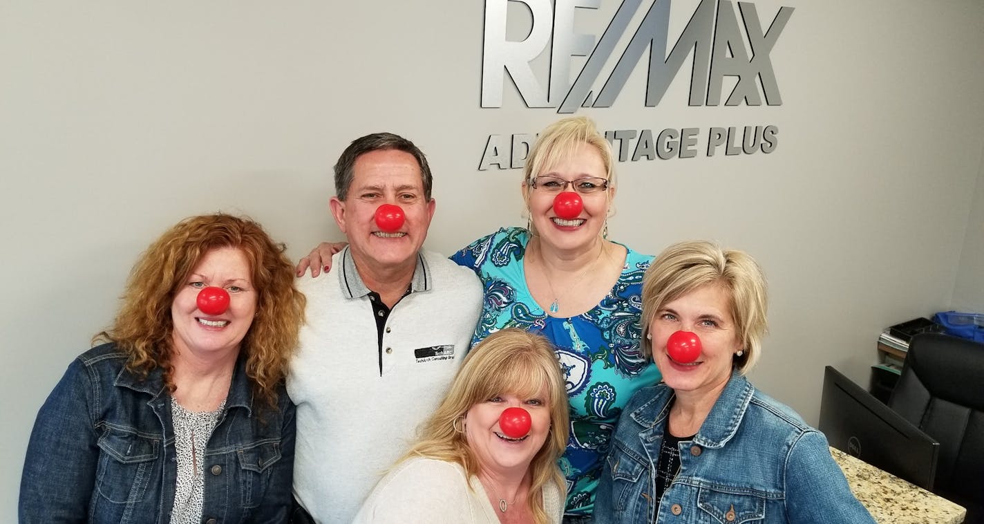 (left to right) Teri Wirt, Randy Walker, Sherry Lewandowski (lower), Lisa Handley, Julie Gould. All are licensed Sales Associates with RE/MAX Advantage Plus. Photo courtesy Re/Max Advantage Plus