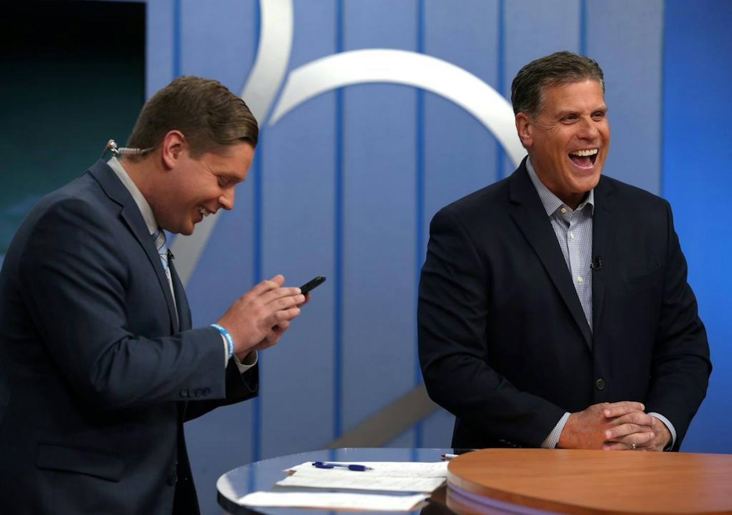 Randy Shaver, right, laughs next to his son, Ryan Shaver, during the Prep Sports Extra show at the KARE 11 studio in Minneapolis on Friday, Nov. 2, 2018.