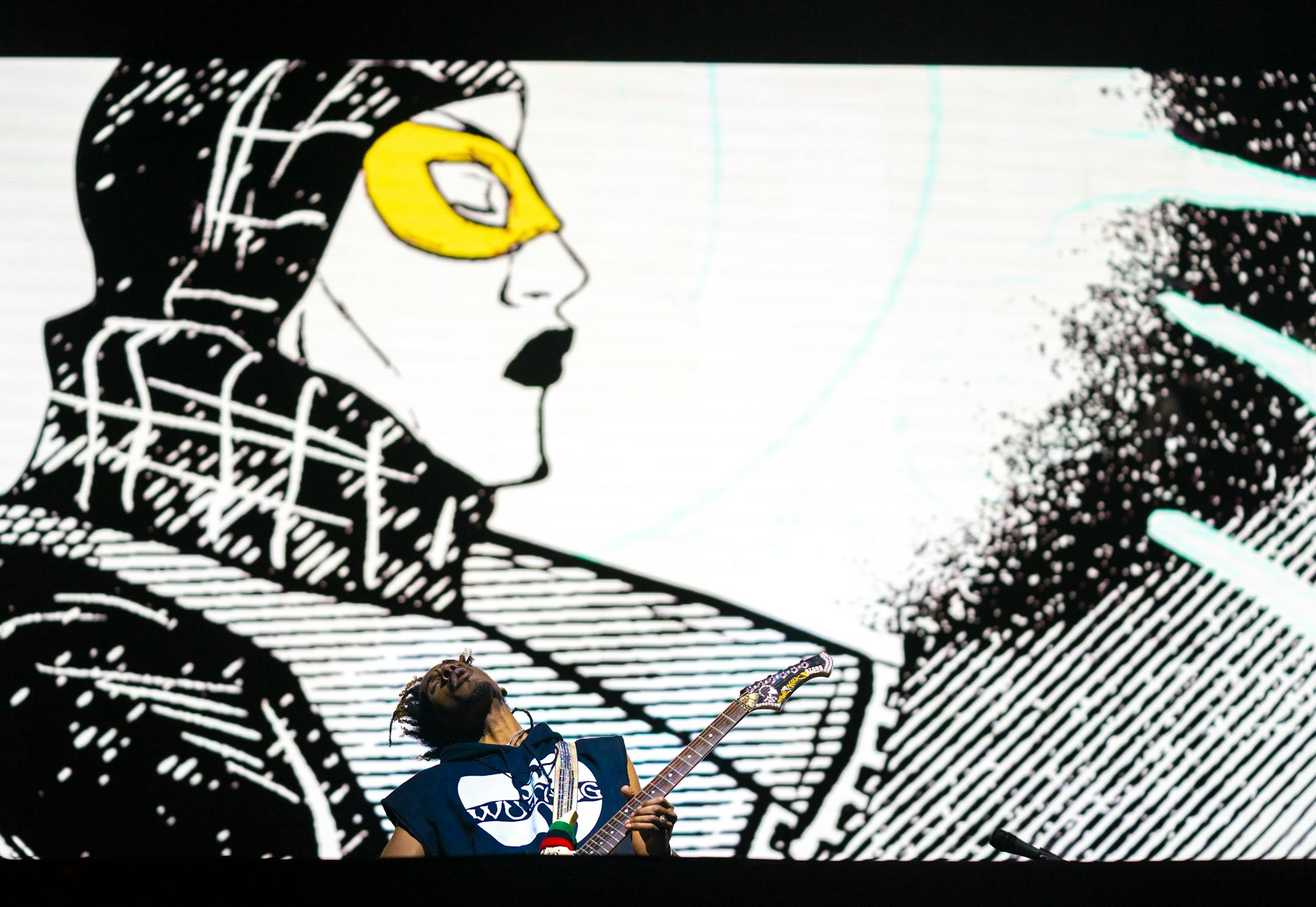 A guitarist with Wu-Tang Clan performs during their New York State of Mind Tour.