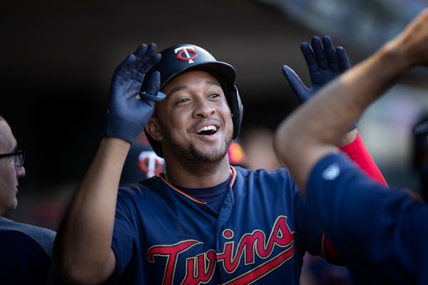 The Twins' Jonathan Schoop celebrated his third-inning solo homer at Target Field on Tuesday, part of a 9-4 victory over Tampa Bay.