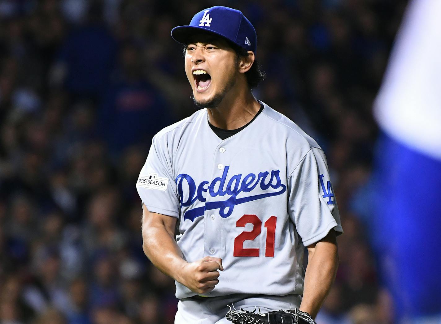 Los Angeles Dodgers pitcher Yu Darvish celebrates after the Chicago Cubs' John Jay grounded into a double play in the sixth inning during Game 3 of the National League Championship Series at Wrigley Field in Chicago on Tuesday, Oct. 17, 2017. (Wally Skalij/Los Angeles Times/TNS)