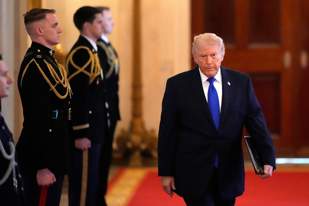 President Donald Trump arrives for an event in the East Room of the White House on Monday.
