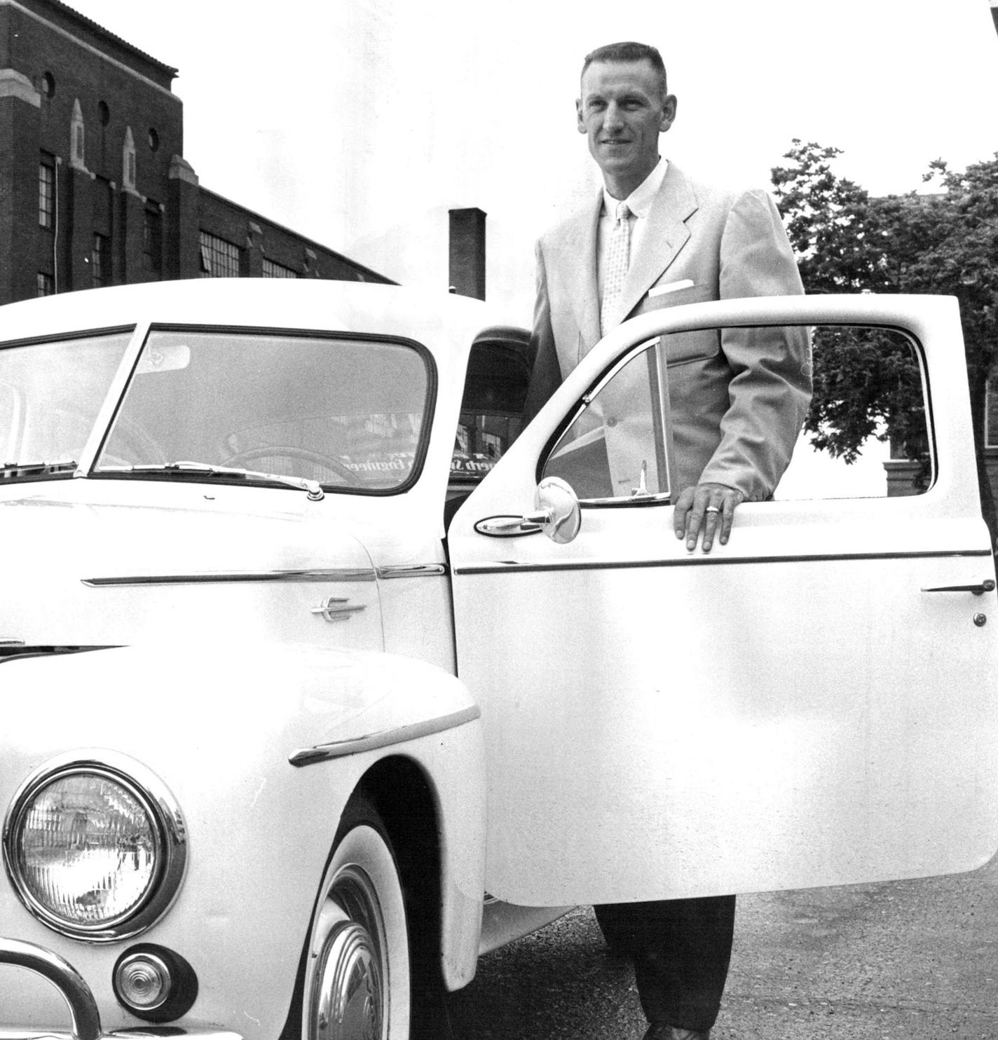 June 13, 1958 BIG MAN, SMALL CAR - Jim Pollard, 6 foot 5 inches, for eight years a star with the Minneapolis Lakers basketball team, has come back to town to sell imported Swedish automobiles. Pollard has become a partner with O. I. Borton and John Hayes in Sportsmen's Pier at 5310 S. Lyndale Av., Minneapolis dealers for the Volvo car and boating equipment. Pollard had been basketball and baseball coach at LaSalle college in Philadelphia, Pa., for three years. June 12, 1958 June 17, 1958 Larry S