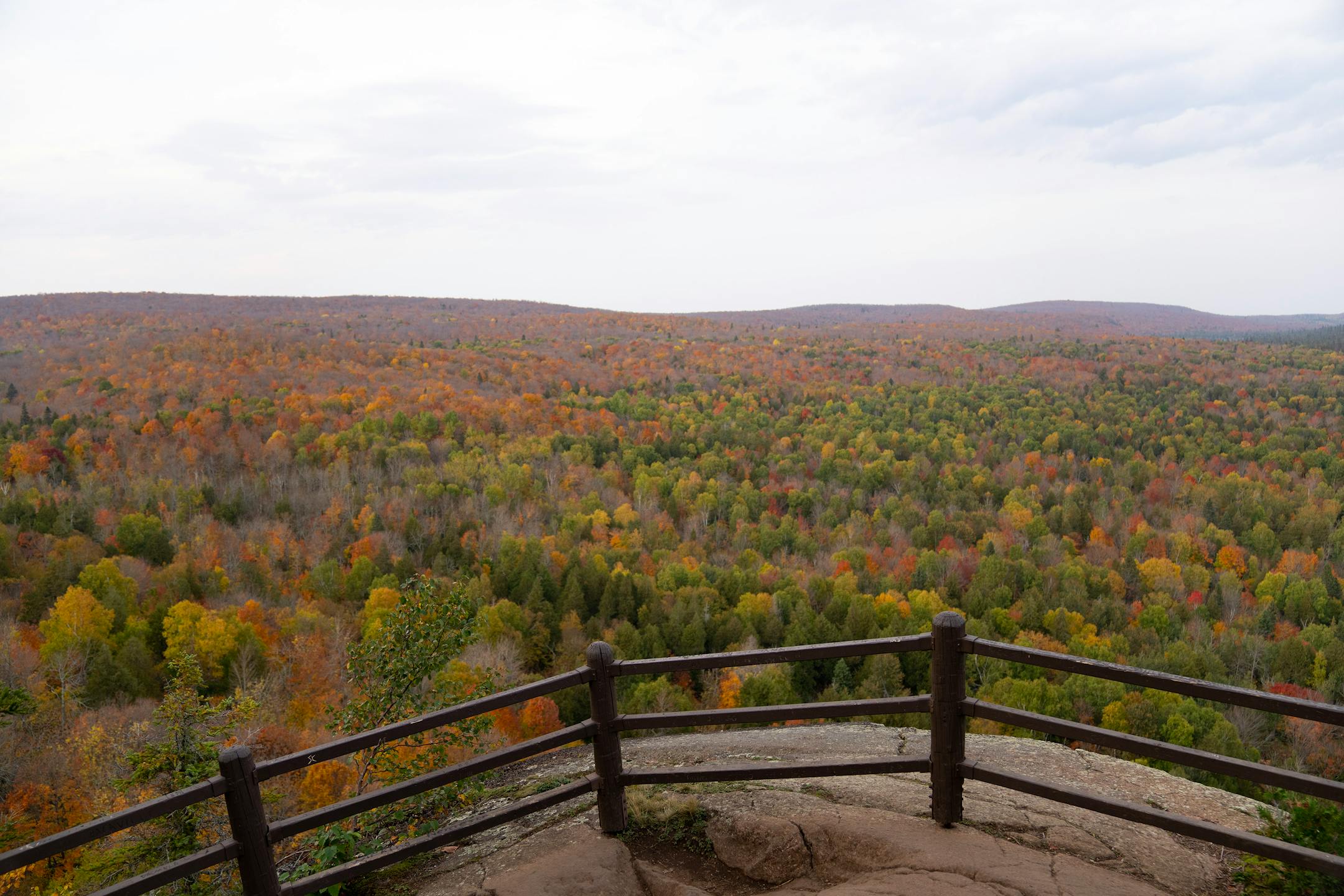 Fall colors are beginning to wash over the landscapes visible on overlooks along the Oberg Mountain hiking trail Tuesday in Tofte, Minn.