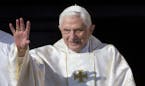 FILE - This Oct. 19, 2014 file photo shows Pope Emeritus Benedict XVI arrives in St. Peter's Square at the Vatican to attend the beatification ceremon