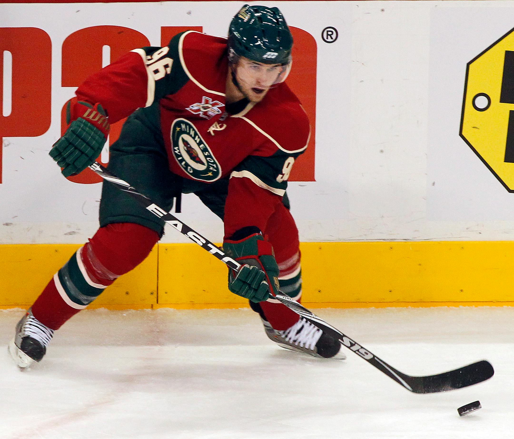 Wild forward Pierre-Marc Bouchard was back on the ice Wednesday after a long recovery from a concussion.