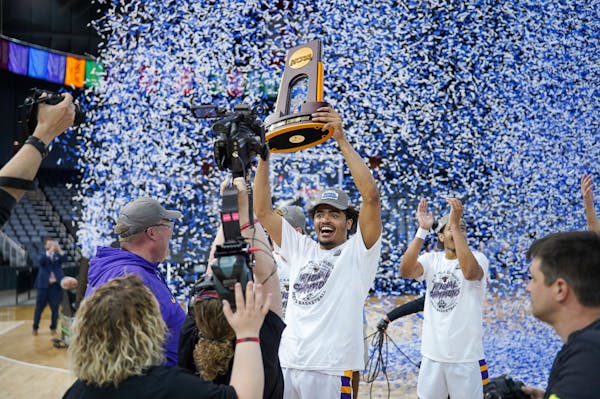 Minnesota State Mankato hero Kyreese Willingham rejoiced with the championship trophy after the Mavericks won the Division II men's basketball title S