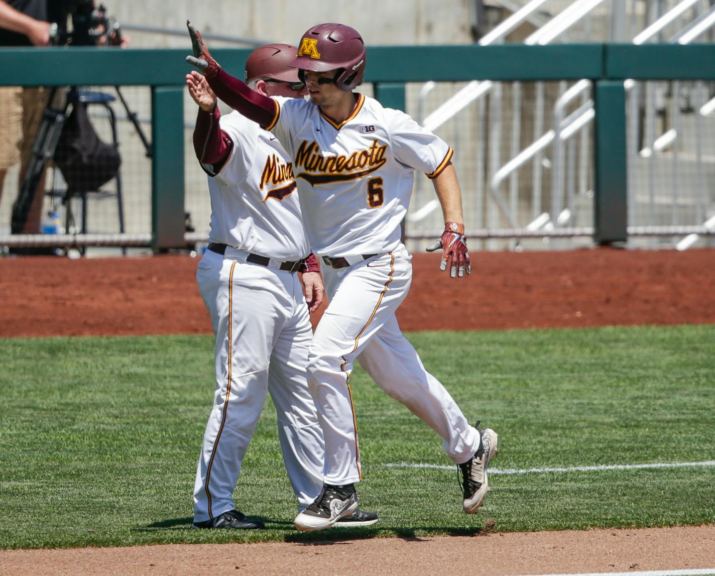 Minnesota's Terrin Vavra (6) rounds the bases after hitting a solo home run against Purdue during the third inning of the NCAA Big Ten baseball championship game in Omaha, Neb., Sunday, May 27, 2018. (AP Photo/Nati Harnik)