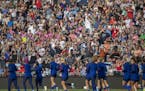 The U.S. women's national team received a standing ovation as they made their way onto the field for an open practice at Allianz Field, Monday, Septem