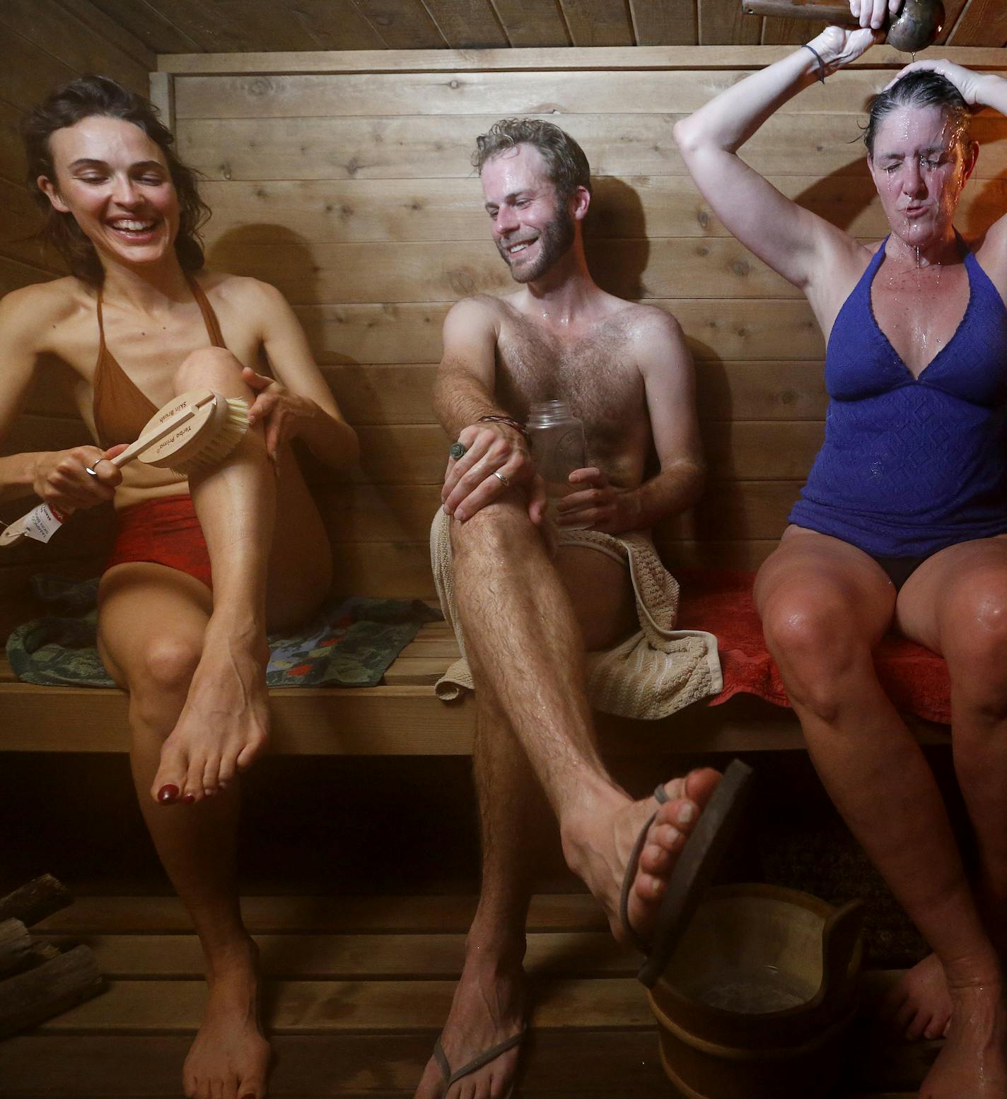 Abigail Rogosheske, John Pederson, Barbara McAfee and Margie Weaver sat in Pederson's portable sauna. ] CARLOS GONZALEZ &#xef; cgonzalez@startribune.com - November 18, 2015, St. Paul, MN, The 612 Sauna Society wants to get people on the bench - on Nicollet Mall. A portable sauna is coming on winter weekends to spur interest in this Nordic tradition. Talk about health all you want, sauna is about building community. John Pederson will be in his portable sauna, parked in a driveway in St. Paul.