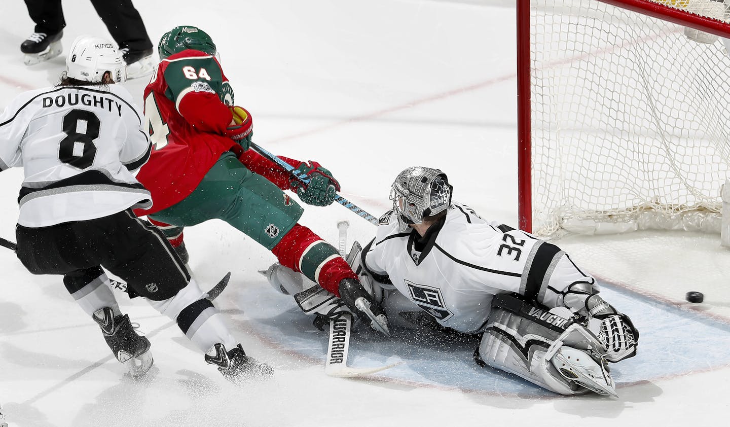 Mikael Granlund (64) shot the puck past Kings goalie Jonathan Quick (32) for the game winning goal in overtime. ] CARLOS GONZALEZ &#x2022; cgonzalez@startribune.com - February 27, 2017, St. Paul, MN, Xcel Energy Center, NHL, Hockey, Los Angeles Kings at Minnesota Wild