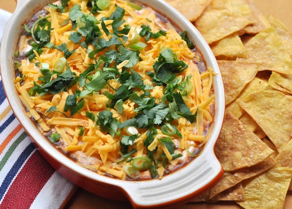 Meredith Deeds, Special to the Star Tribune Mexican Layered Dip with Baked Tortilla Chips