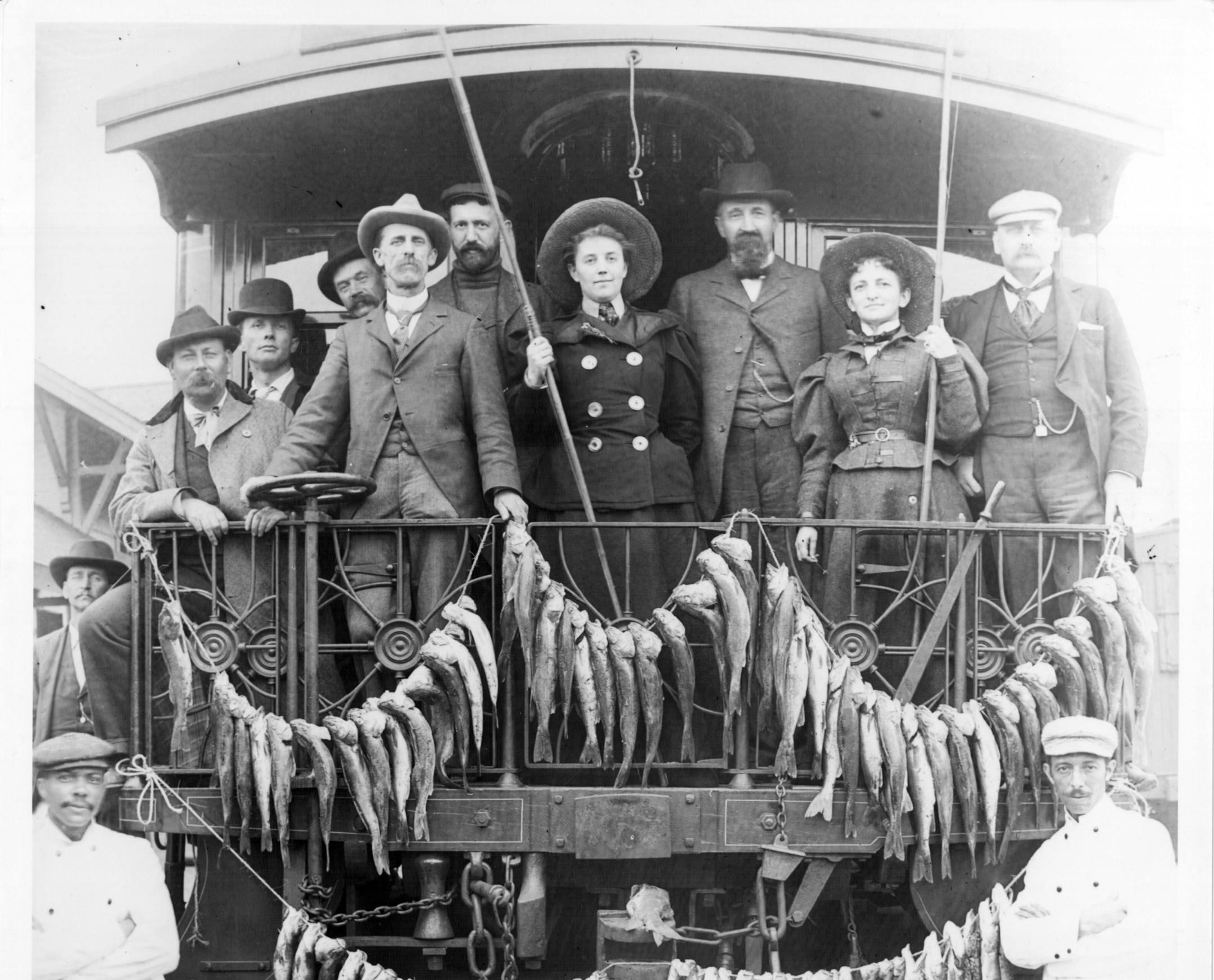 This elegant crowd, which includes Minnesota Gov. John Lind (second man from right on the train), showed off their catch in 1899.