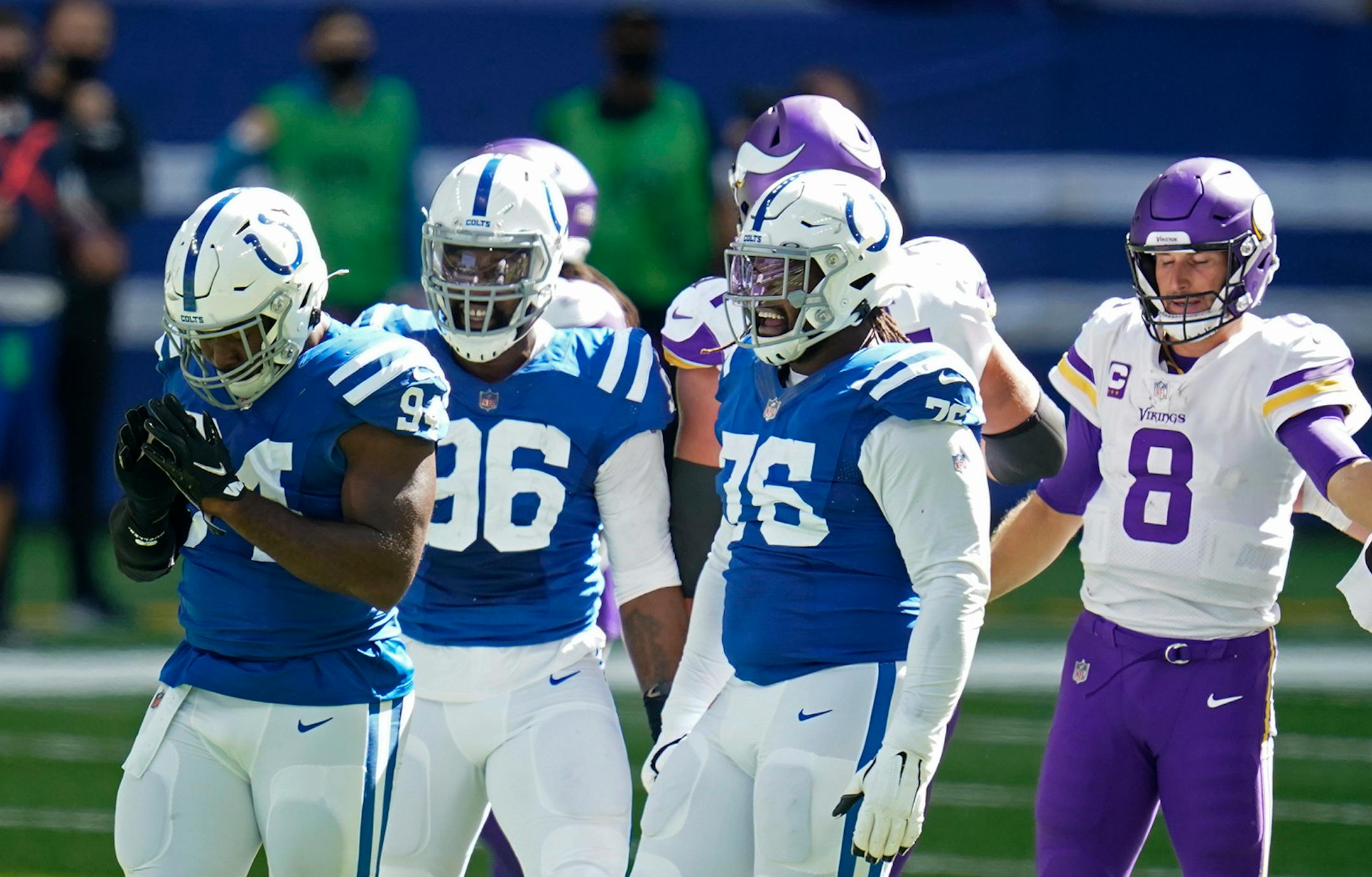 Indianapolis Colts defensive end Tyquan Lewis (94) celebrates a sack of Minnesota Vikings quarterback Kirk Cousins (8) during the second half of an NFL football game, Sunday, Sept. 20, 2020, in Indianapolis.