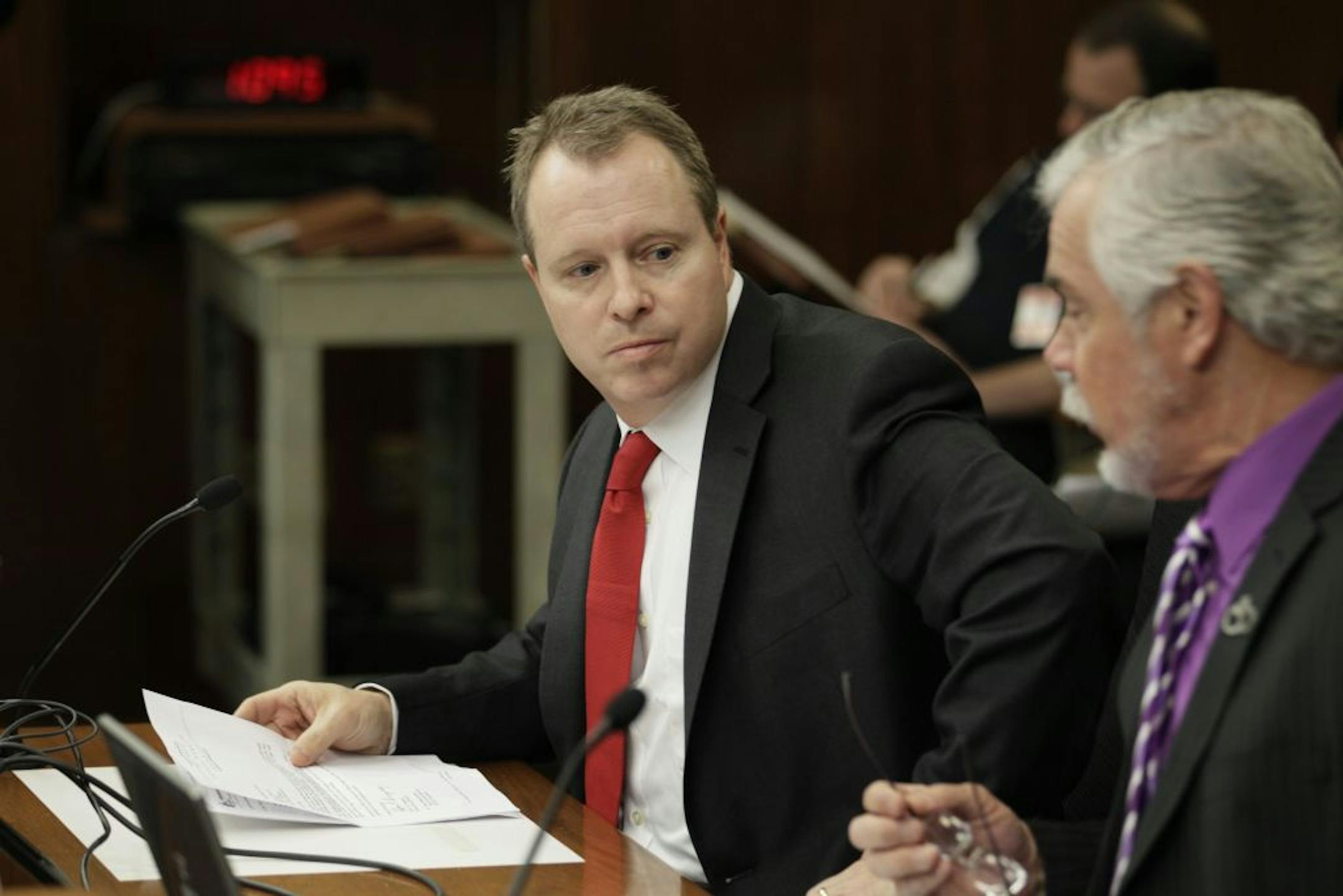 Tim Scannell, left, joined colleagues in petitioning the Legislature in 2012 for better protection for prosecutors.