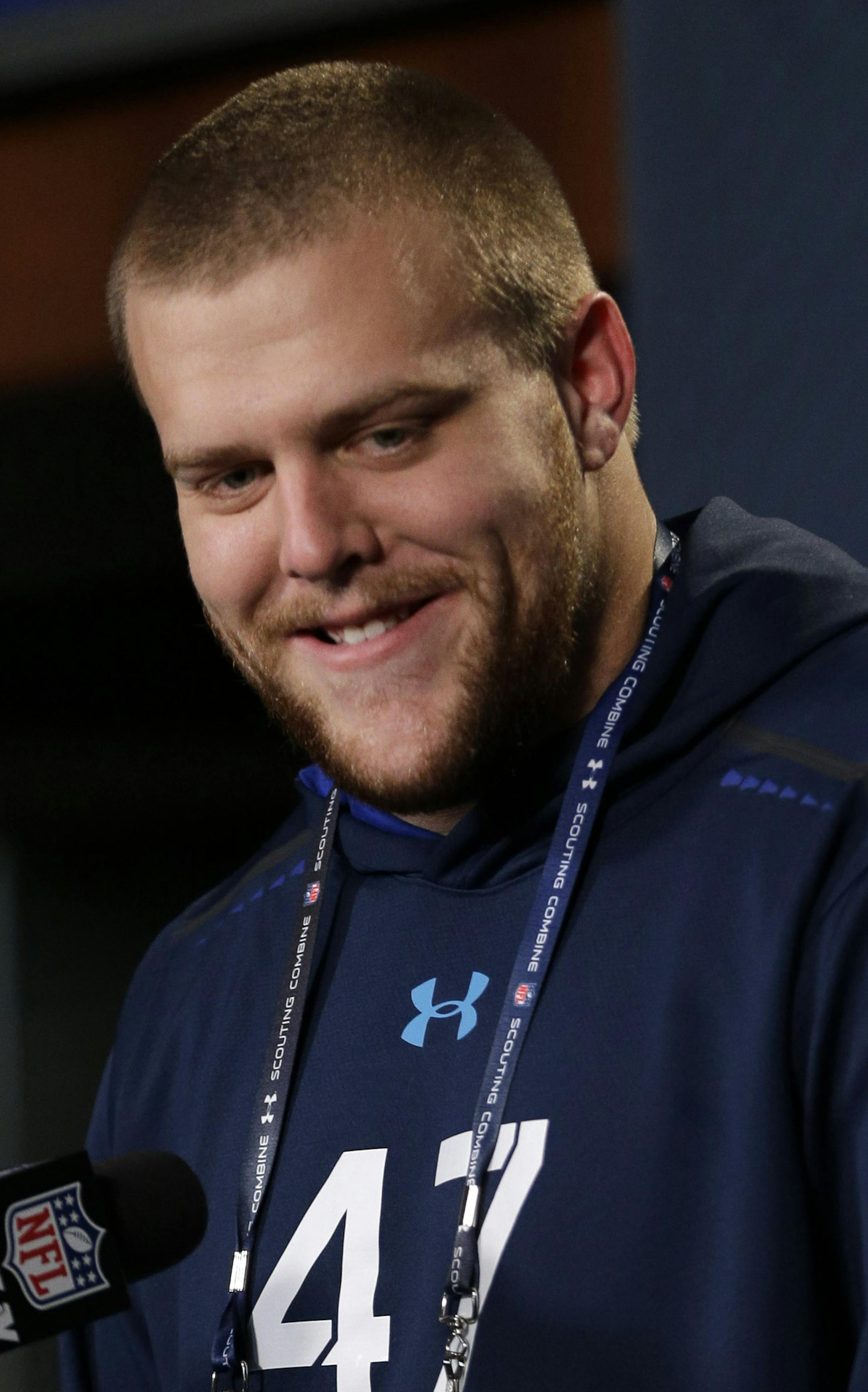 Iowa offensive lineman Brandon Scherff answers a question during a news conference at the NFL football scouting combine in Indianapolis, Thursday, Feb. 19, 2015. (AP Photo/David J. Phillip) ORG XMIT: INDP158