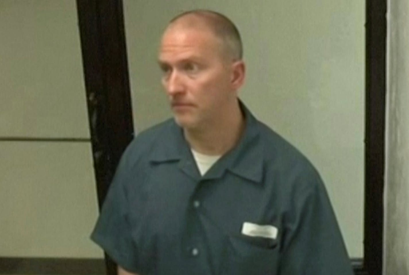 Former Minneapolis police officer Derek Chauvin, serving time for the 2020 murder of George Floyd, appears via Zoom from a federal prison in Tucson, Ariz., on Friday, March 17, 2023. Chauvin pleaded guilty to aiding and abetting, failing to file tax returns to the state of Minnesota for the years 2016 and 2017. (Minnesota Judicial Branch via AP)