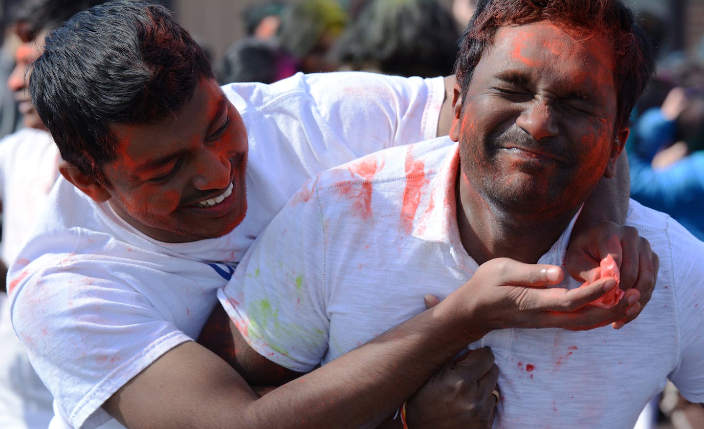 Anil Malipeddi and Sagar Mandarapu, both of Edina, celebrated at a spring Holi festival in Farmington. Photo by Liz Rolfsmeier