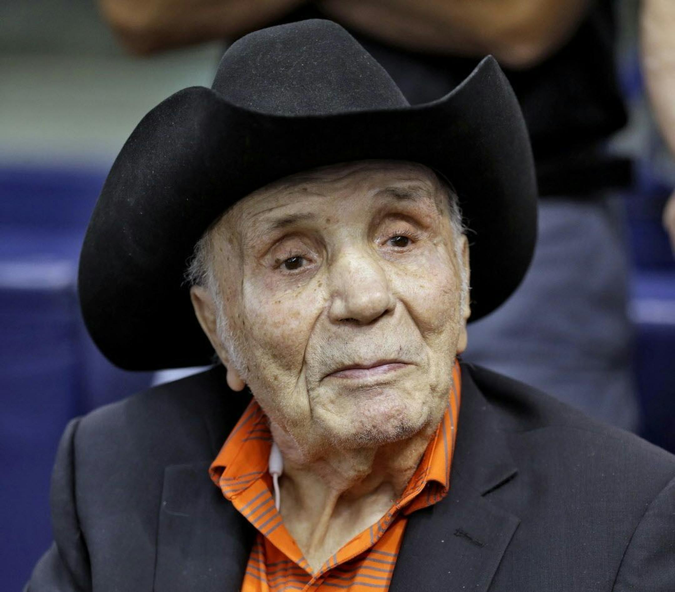 FILE - In this Sept. 15, 2015, file photo, Jake LaMotta watches batting practice before a baseball game between the Tampa Bay Rays and the New York Yankees, in St. Petersburg, Fla. LaMotta, whose life was depicted in the film "Raging Bull," died Tuesday, Sept. 19, 2017, at a Miami-area hospital from complications of pneumonia. He was 95.