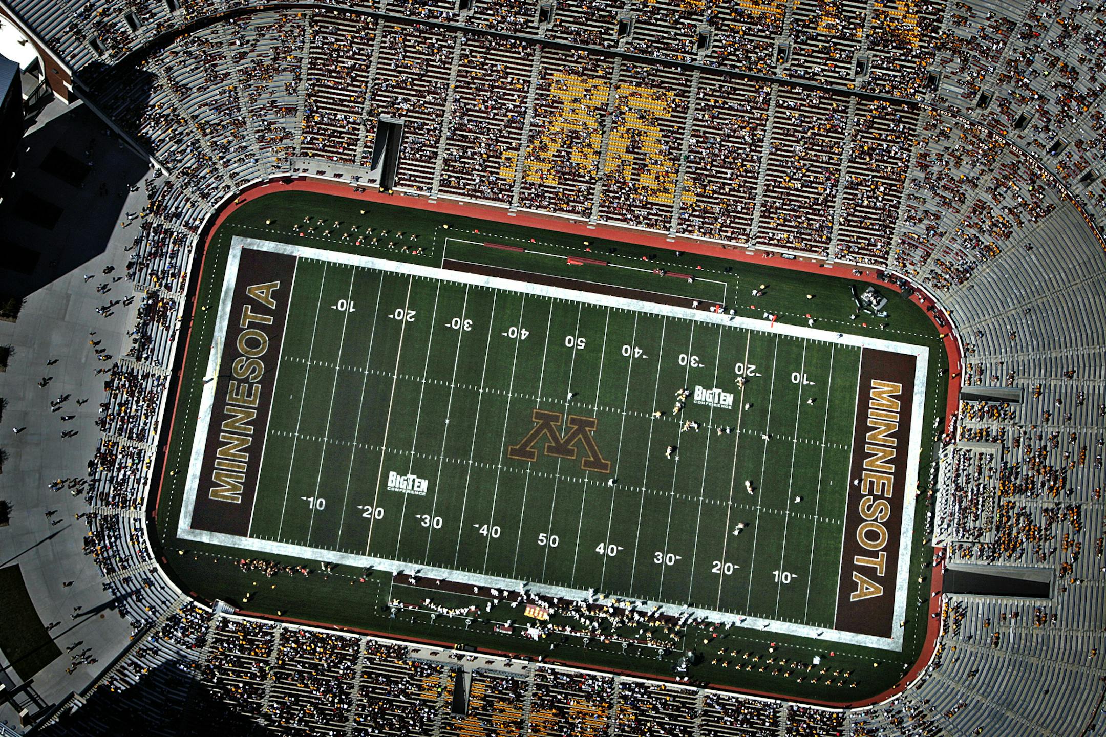 JIM GEHRZ &#x2022; jgehrz@startribune.com Minneapolis/August 22, 2009/3:10PM FOR USE IN SPECIAL SECTION ONLY Members of the University of Minnesota Golden Gophers football team held a team scrimmage at the newly constructed TCF Bank Stadium. This was the first public event hosted at the building and in addition to the scrimmage, the Gophers held a victory walk from McNamara Alumni Center to the stadium. ORG XMIT: MIN2013112919320667